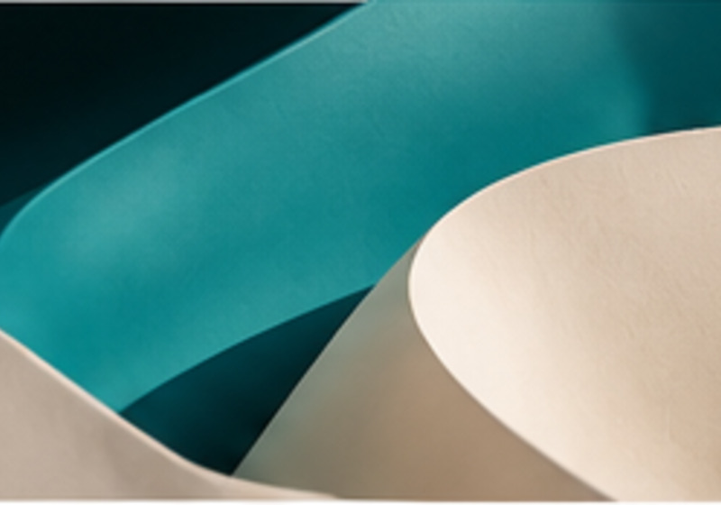 Connected teal and ivory sculptural curves
